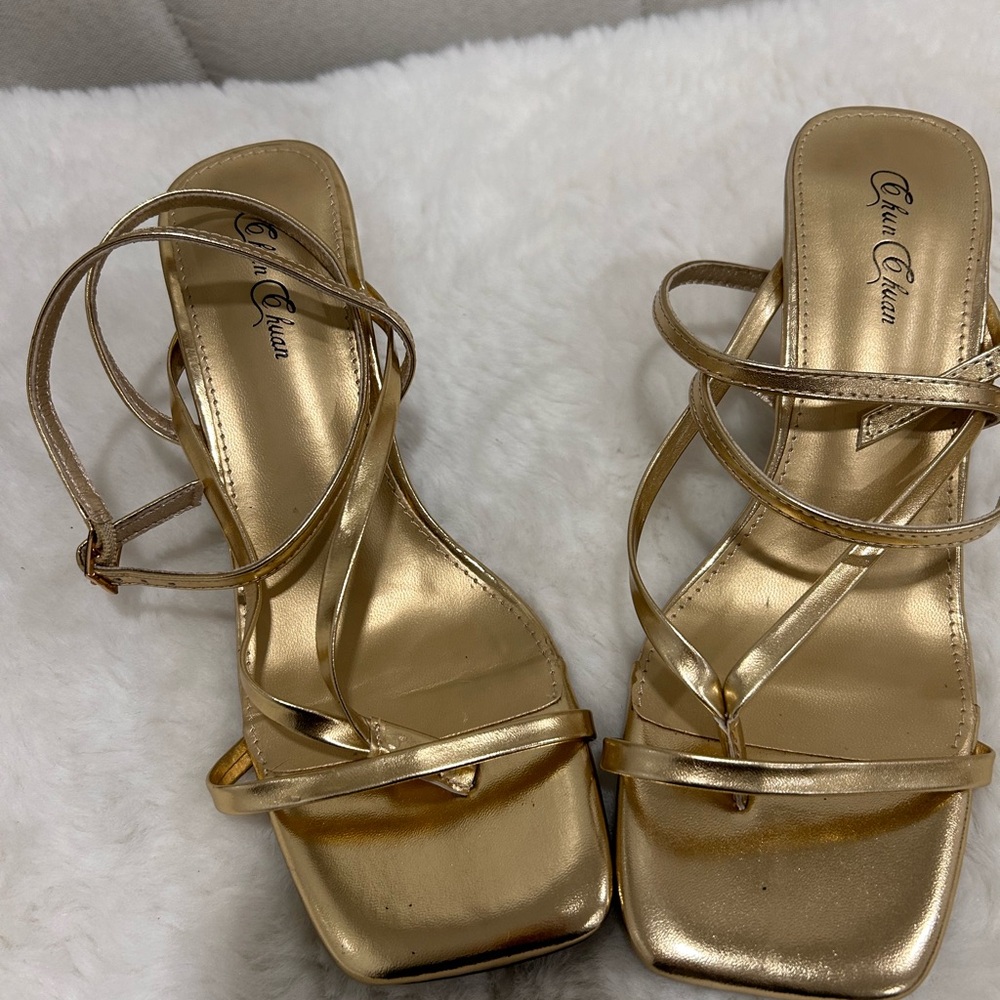 Gold heels ,